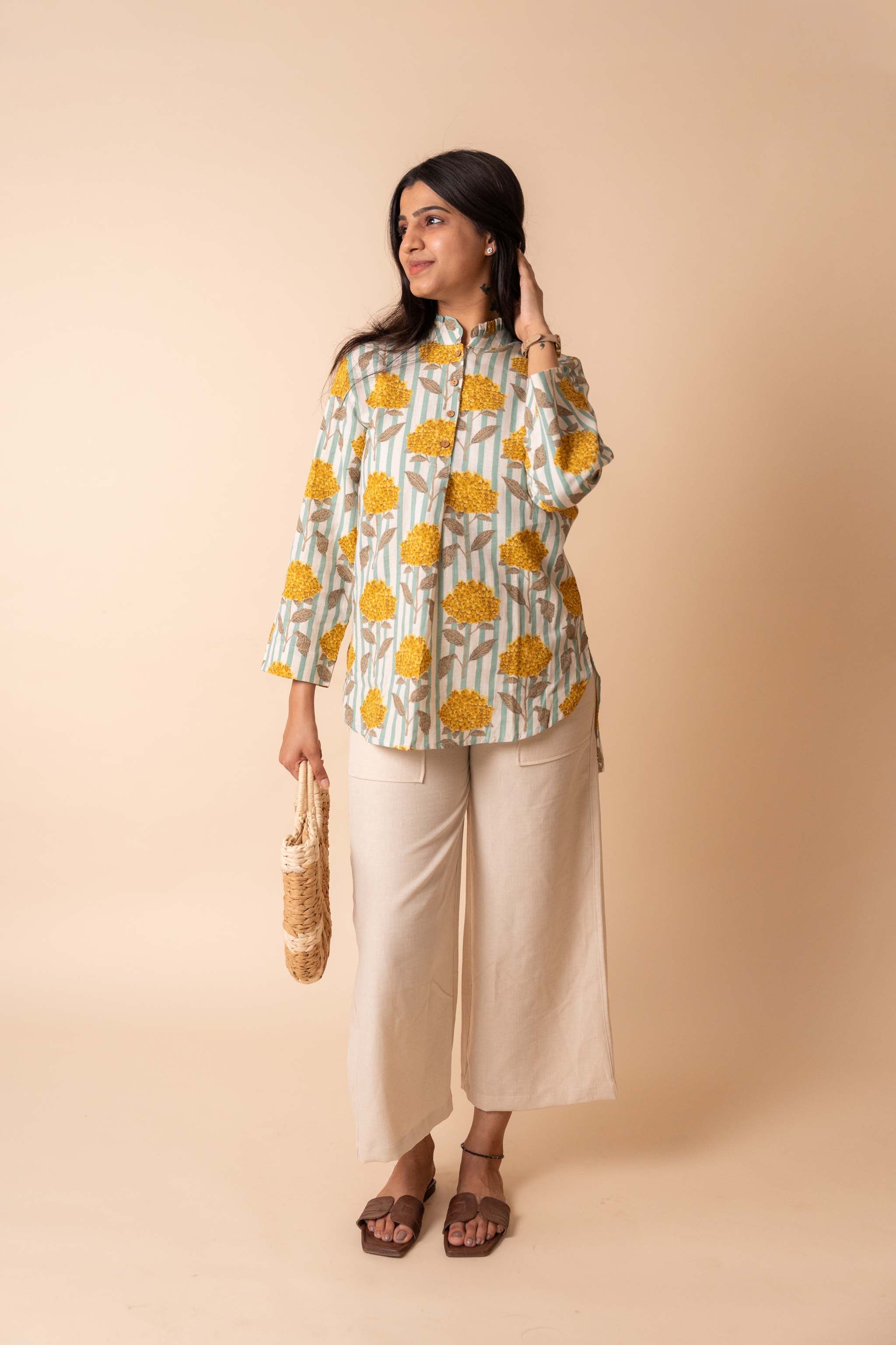 fabric detail of Yellow Floral Striped Top with mandarin collar in a relaxed fit, women's tunic
