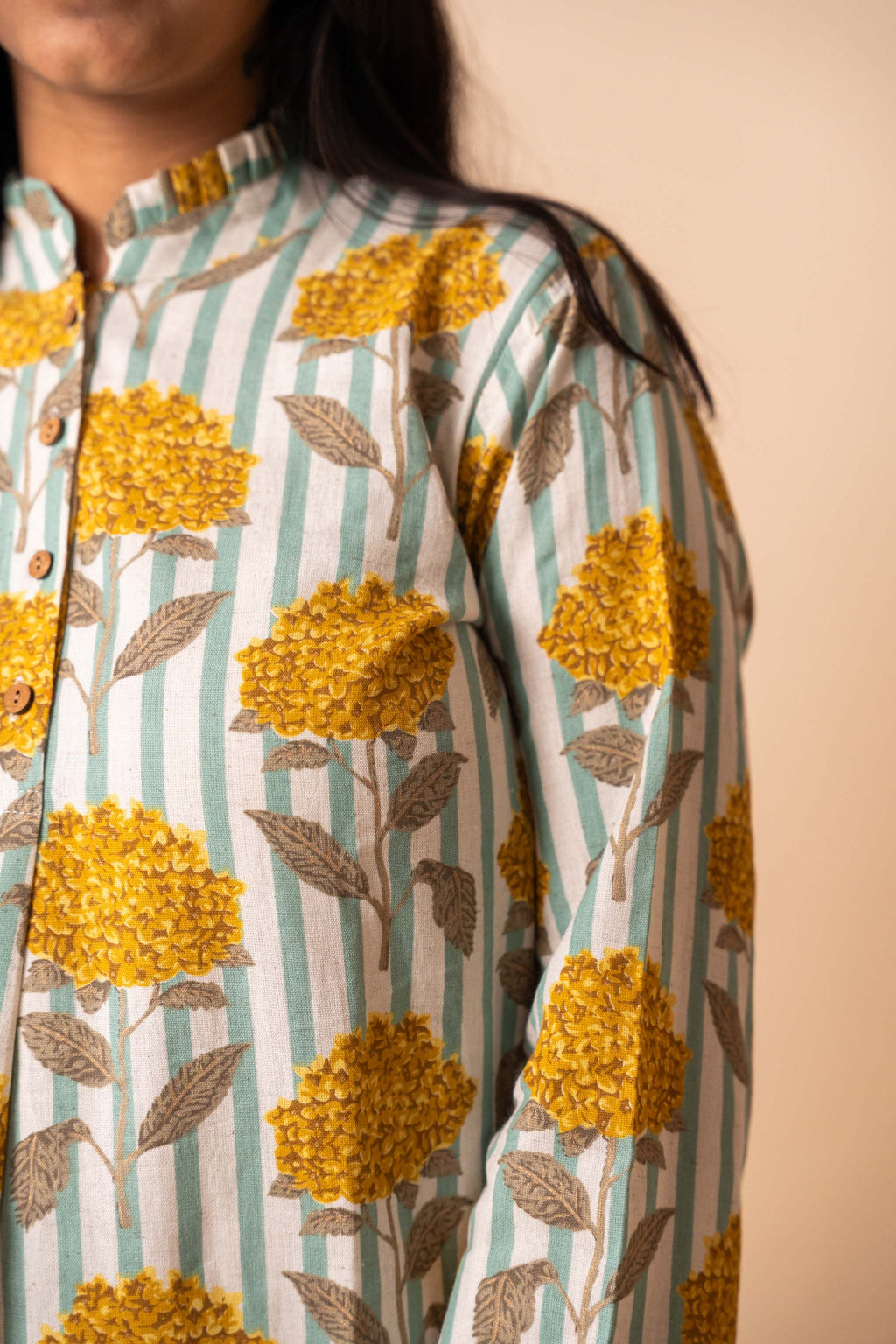 neckline detail of Yellow Floral Striped Top featuring soft pleats for office and workwear, women's tunic
