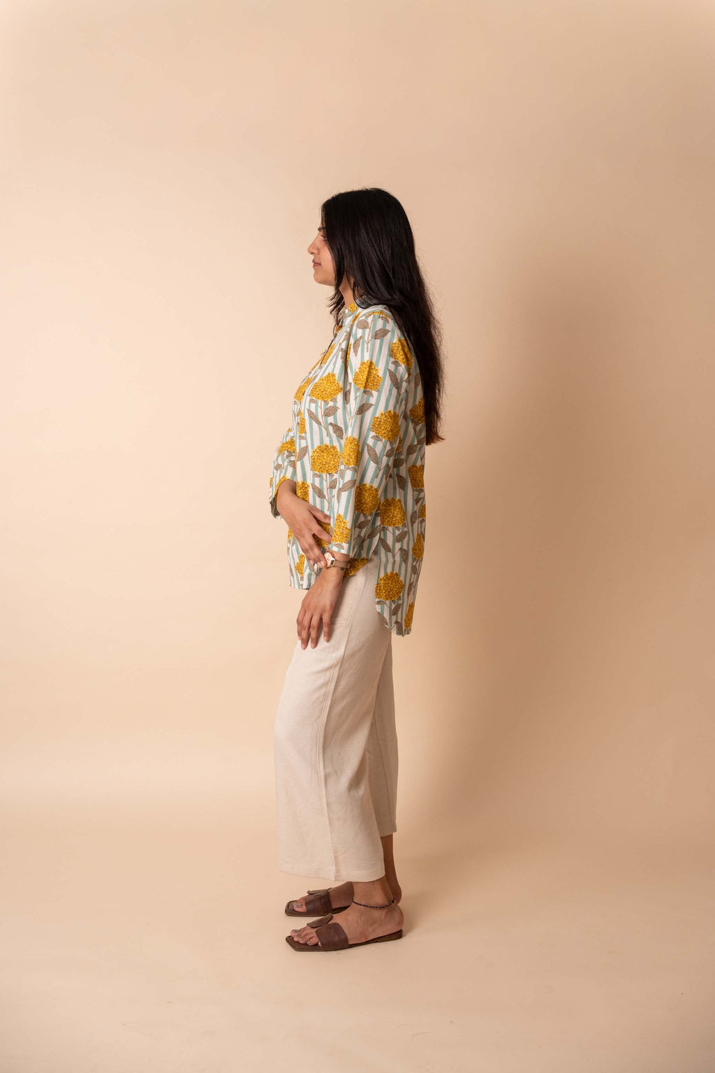 styling detail of Yellow Floral Striped Top featuring soft pleats for office and workwear, women's tunic