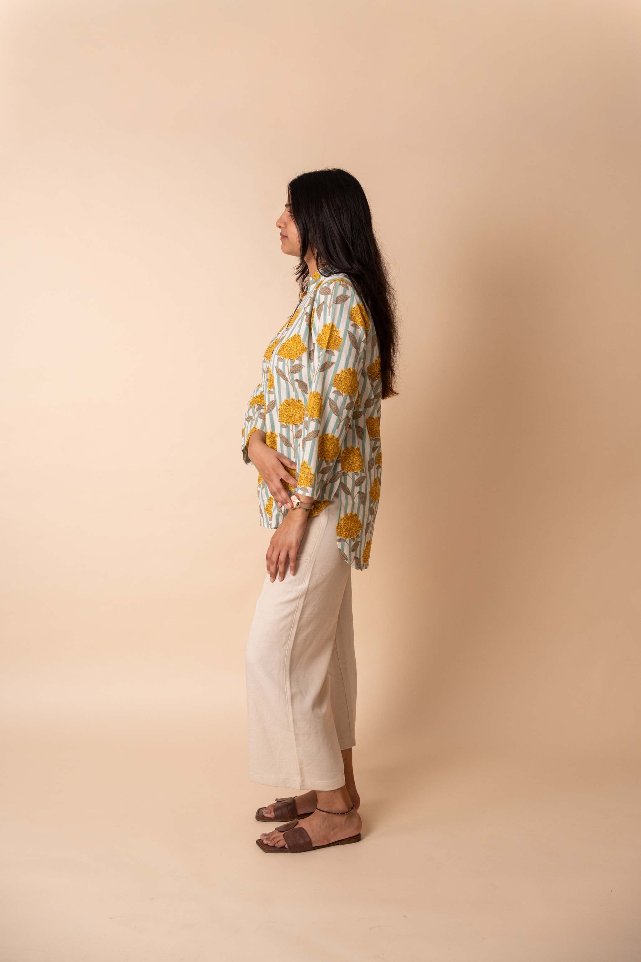styling detail of Yellow Floral Striped Top featuring soft pleats for office and workwear, women's tunic