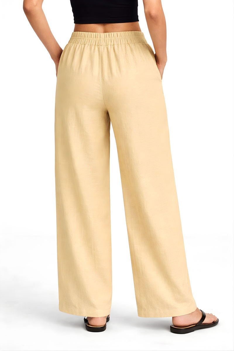 side profile of Beige Wide Leg Linen Pant in linen in a wide fit, women's wide-leg pants