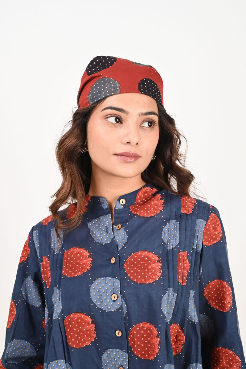 neckline detail of Blue Polka Pleated Shirt featuring button-up front for office and workwear, women's shirt
