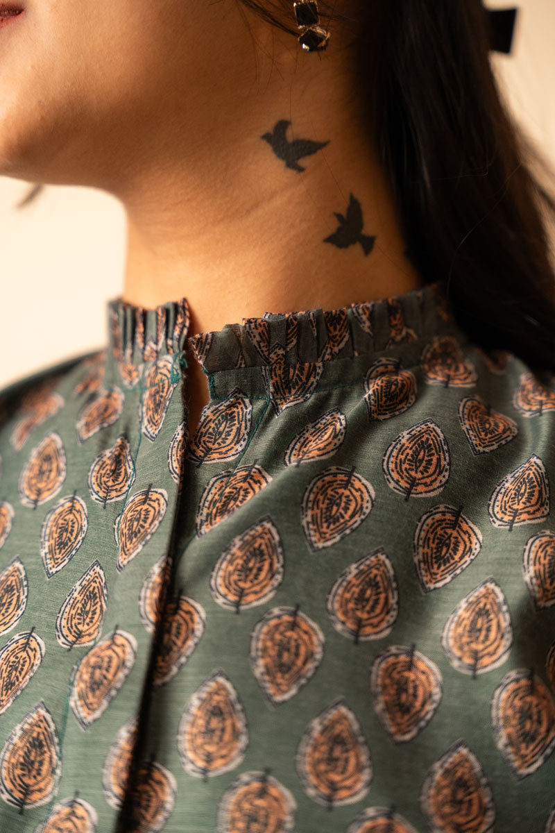 fabric detail of Green Chanderi Shirt in a regular fit featuring shoulder yoke, women's tunic
