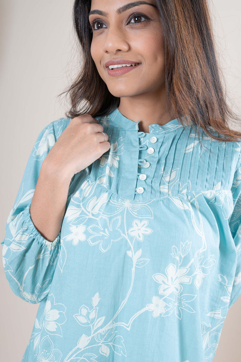 neckline detail of Light Blue Floral Printed Top for office and workwear, women's tunic