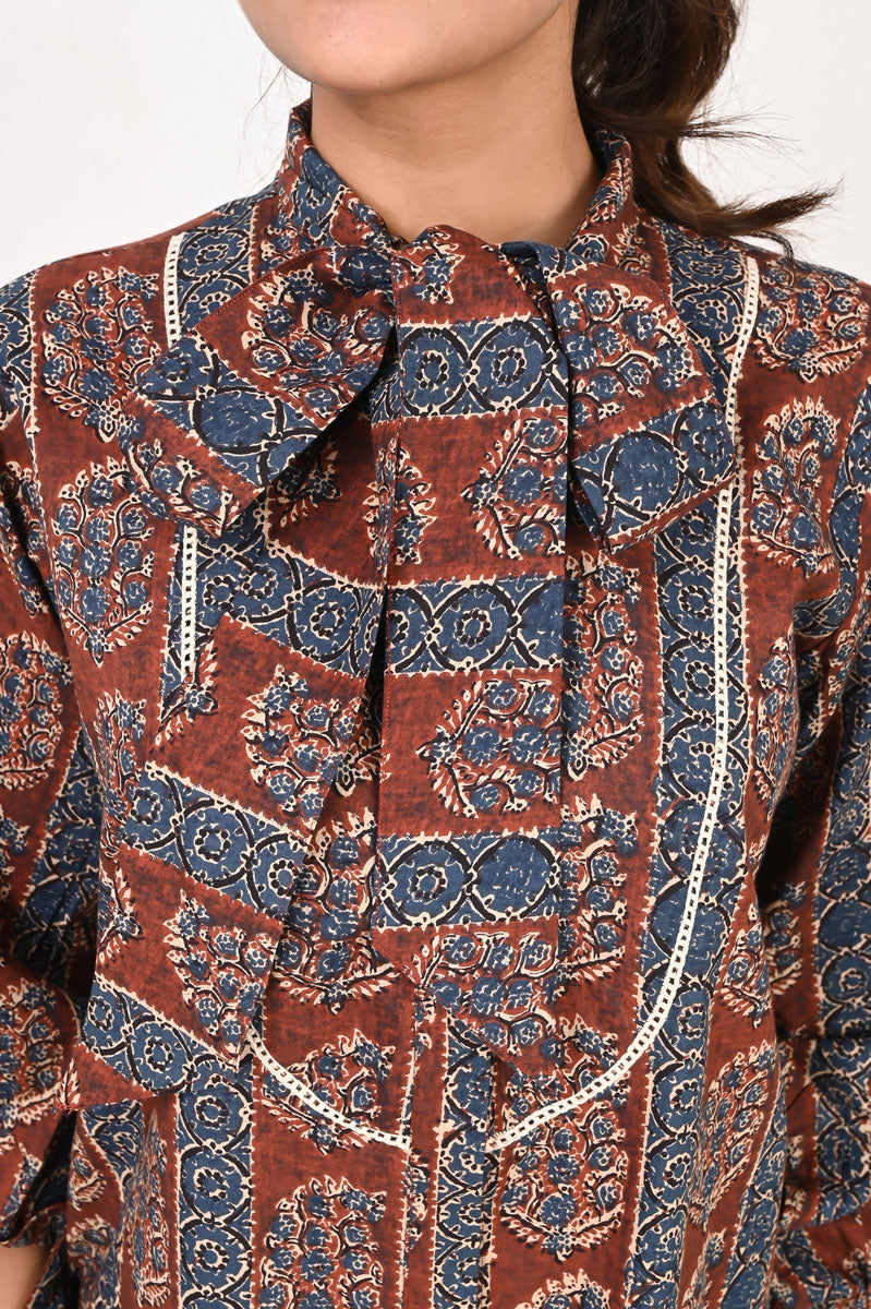 side profile of Maroon Printed Neck Tie Shirt featuring button-up front for office and workwear, women's shirt