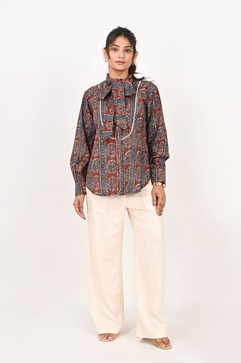 neckline detail of Maroon Printed Neck Tie Shirt featuring button-up front for office and workwear, women's shirt