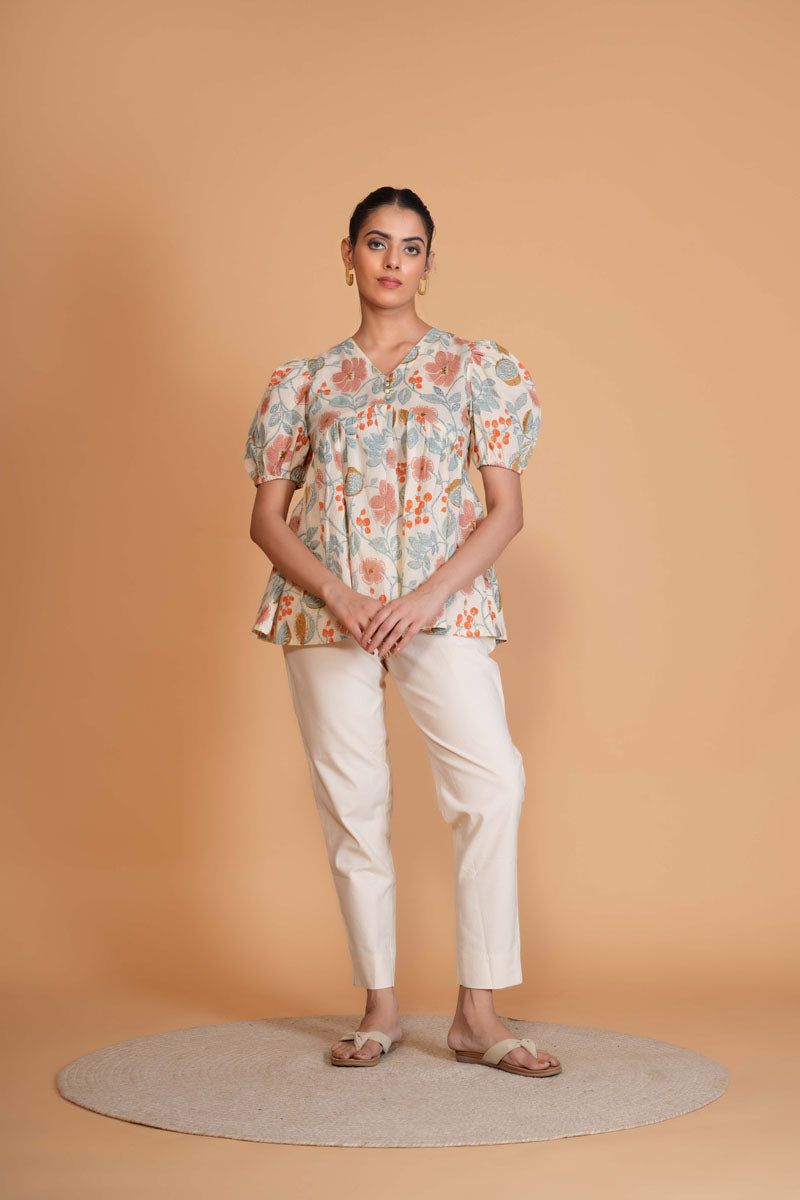 back view of Off White Floral Alia Cut Top in cotton with floral print, women's tunic