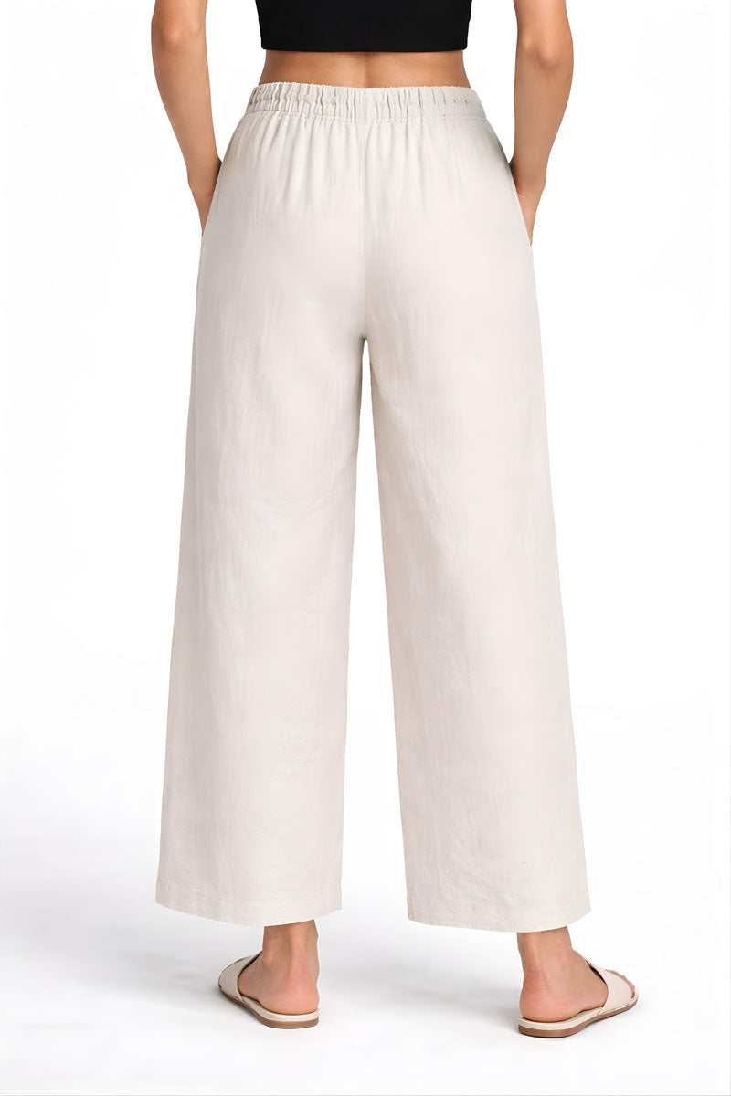 fabric detail of Off White Wide Leg Linen Pant in linen in a wide fit, women's wide-leg pants