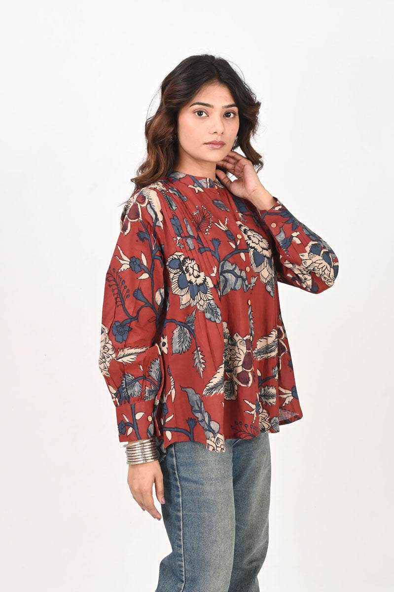 neckline detail of Red Kalamkari Pleated Shirt featuring button-up front for office and workwear, women's shirt